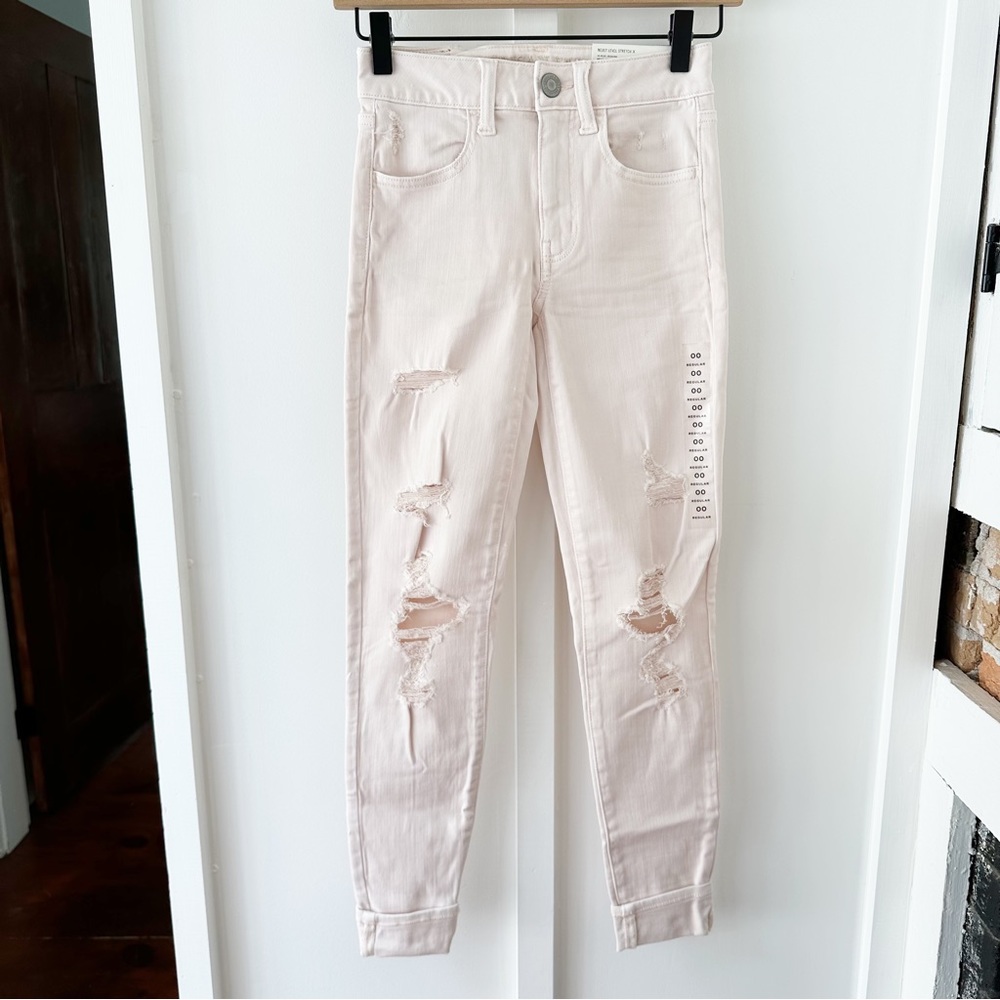 AMERICAN EAGLE pink destroyed high rise jegging jeans